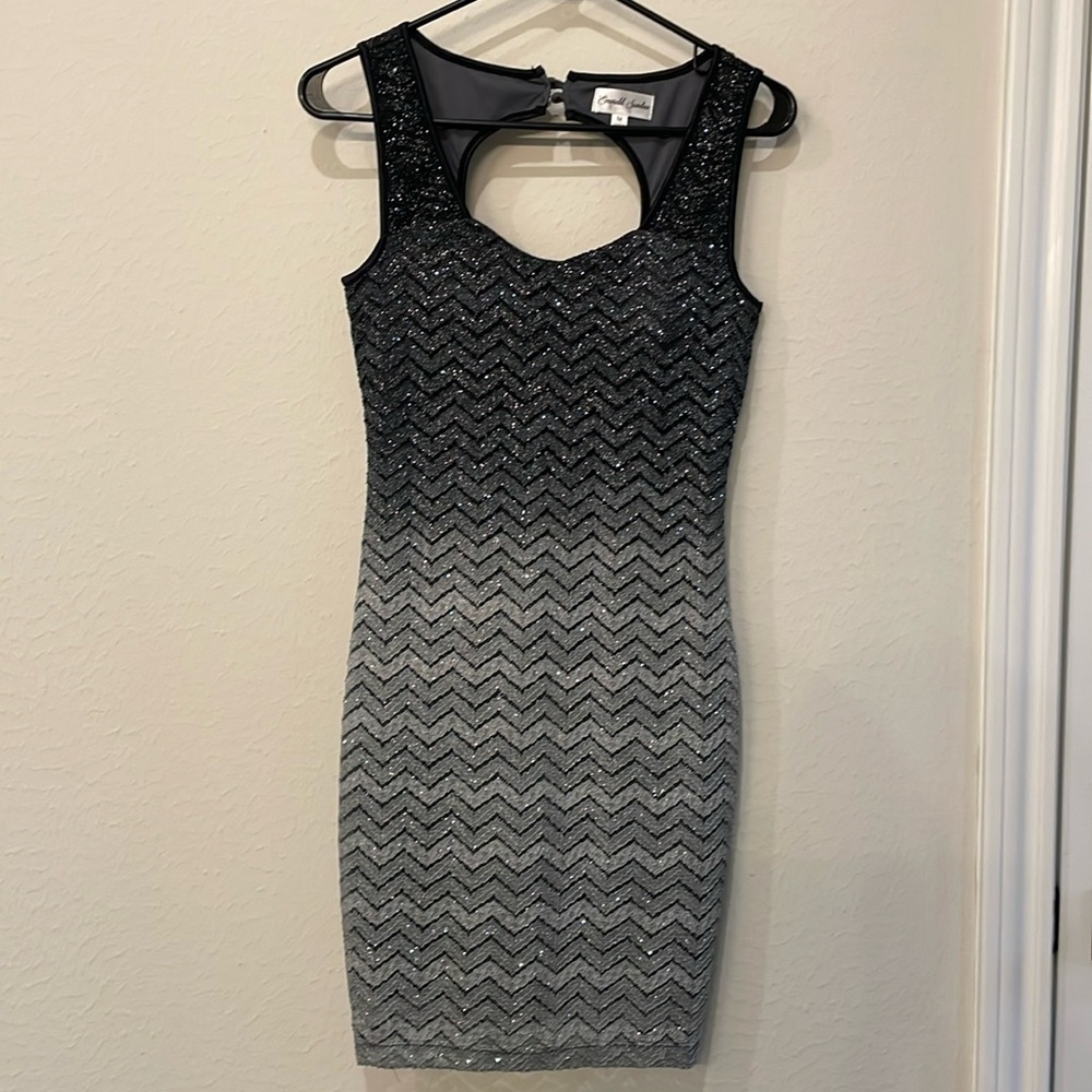 Never worn dress that is above the knee